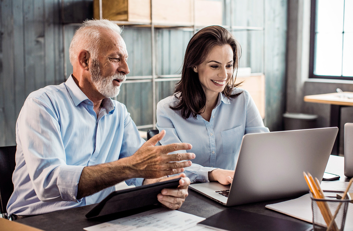 Allsup Benefits Coordination agent showing a customer Medicare options on a laptop.